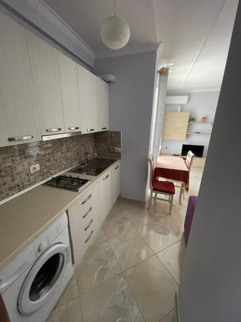 Kitchen or kitchenette, Dining area, Communal kitchen, stove, washing machine