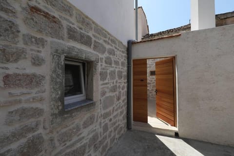 Stone house in the center of Murter town Villa in Murter