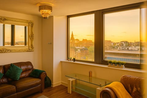 View (from property/room), Living room, Seating area, Sunset