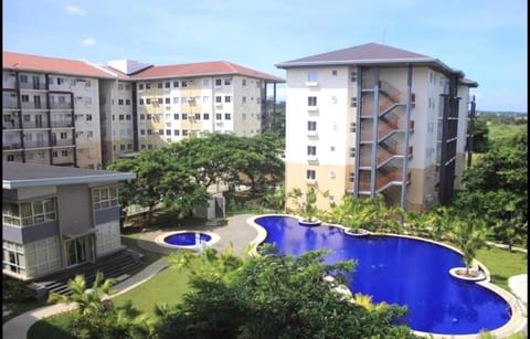 Amaia Steps Nuvali fully furnished unit with swimming pool view near Carmelray Pitland Condominio in Calamba