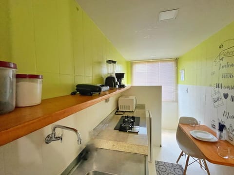 LOFT aconchegante no Centro de Macaé, Wifi, Ar condicionado e Cozinha completa Apartamento in Macaé