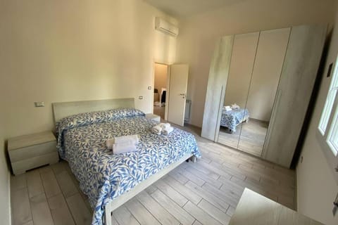 Bed, Photo of the whole room, Bedroom, towels, wardrobe