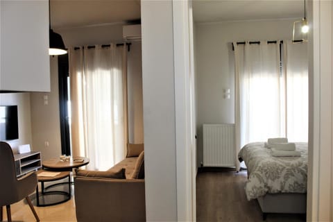 Bed, Living room, Seating area, Bedroom