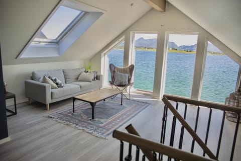 View (from property/room), Living room, Seating area, Mountain view, Sea view