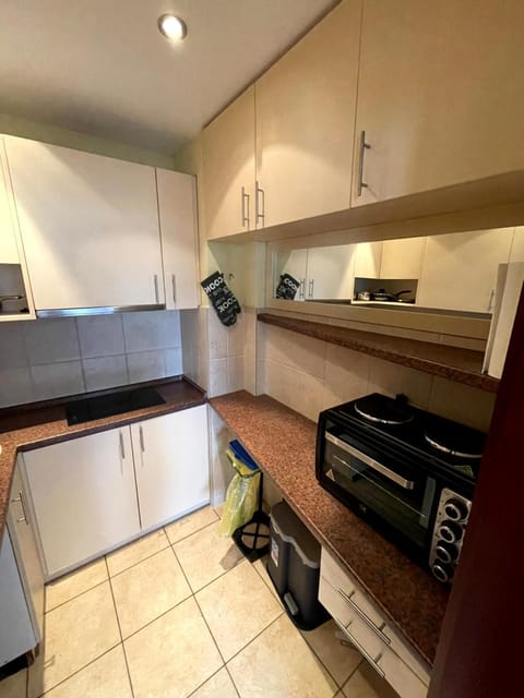 Kitchen or kitchenette, oven, stove