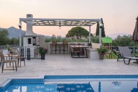 Patio, BBQ facilities, Swimming pool