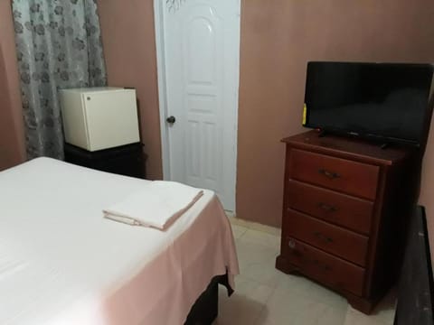 Room in Guest room - Apartahotel Next Nivel - Queen Room with Fan Bed and Breakfast in Punta Cana
