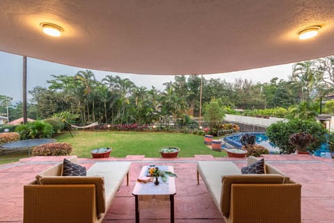 StayVista's Shantam House - Dive into relaxation with a pool and tennis lawn Villa in Lonavla