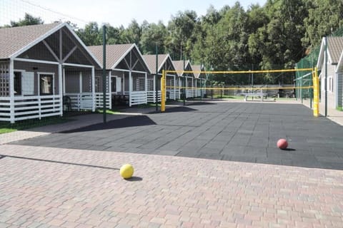 Holiday complex with the pool and volleyball in Miedzyzdroje House in Miedzyzdroje