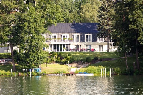 Property building, Spring, Day, Natural landscape, Garden, Garden view, Lake view