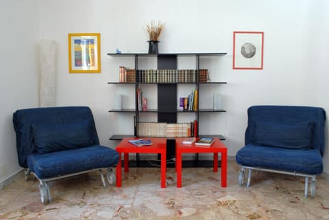 Library, Living room, Seating area, Bedroom