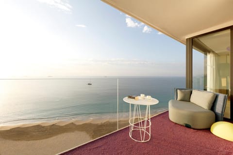 View (from property/room), Balcony/Terrace, Seating area, Beach, Sea view