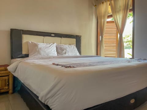 Aira Homestay near Pantai Kuta Mandalika Mitra RedDoorz Alquiler vacacional in Pujut