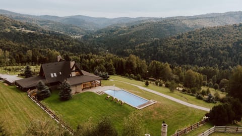 Property building, Spring, Day, Natural landscape, Bird's eye view, Mountain view, Pool view, Swimming pool