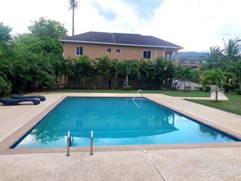 Lovely Ensuite Getaway with Pool Apartment in St. Ann Parish