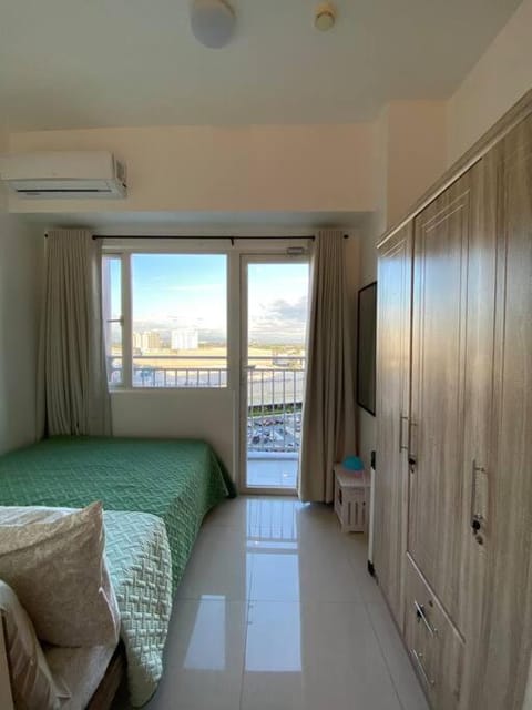 Cozy 1 BR Apartment At South Residences Tower 2 Eigentumswohnung in Las Pinas