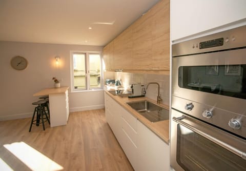 Kitchen or kitchenette, oven, stove, toaster