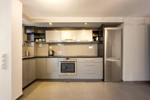 Kitchen or kitchenette, oven, stove