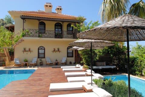 An unspoilt setting, luxurious surroundings and a warm, personal welcome Villa in Muğla Province