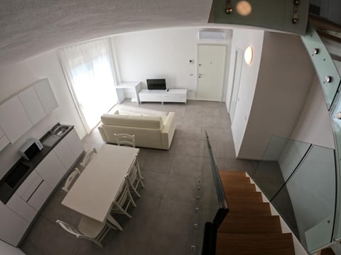Residence Al Molo - Suite Porta del Mar Sea View - Agenzia Cocal Apartment in Porto Santa Margherita
