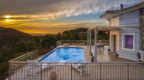 Property building, Patio, Nearby landmark, Natural landscape, View (from property/room), Balcony/Terrace, Mountain view, Pool view, Swimming pool, Sunset, sunbed