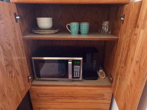 Kitchen or kitchenette, microwave