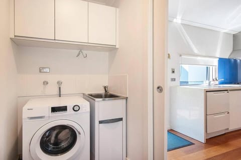 Kitchen or kitchenette, laundry