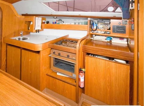 Cosy Sailing Boat Glamping Accommodation on the River in Sandwich Docked boat in Sandwich