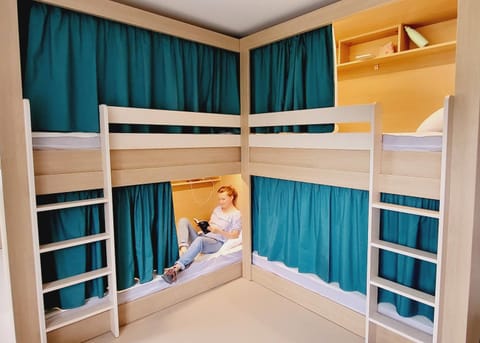 Garden view, group of guests, bunk bed, microwave, storage