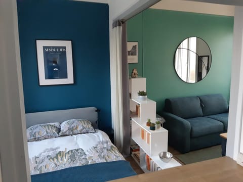 Bed, Library, Seating area, Bedroom