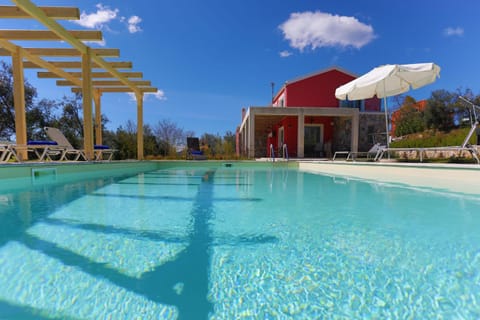 Property building, Day, Pool view, Swimming pool, sunbed