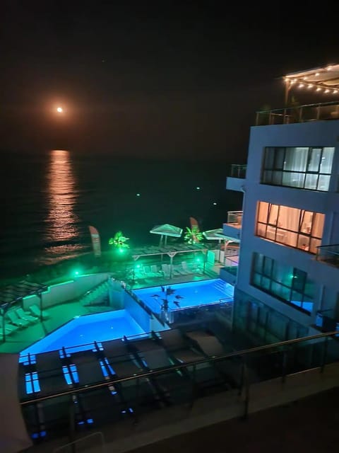 Night, Pool view, Swimming pool, sunbed