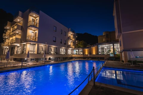 Property building, Night, Pool view, Swimming pool