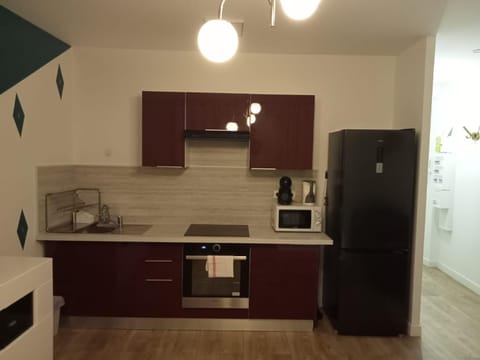 Kitchen or kitchenette, stove, kitchen