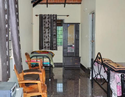 Evergreen homestay by StayApart, Coorg Vacation rental in Madikeri