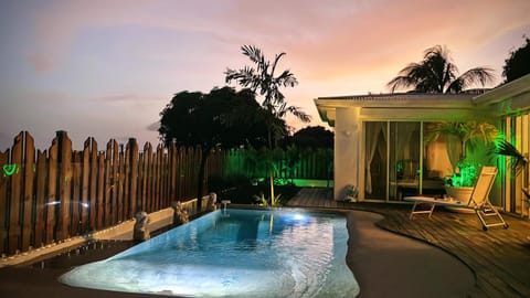 Property building, Patio, Night, Natural landscape, Garden, Garden view, Pool view, Swimming pool, sunbed