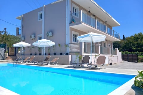 Property building, Pool view, Swimming pool, sunbed