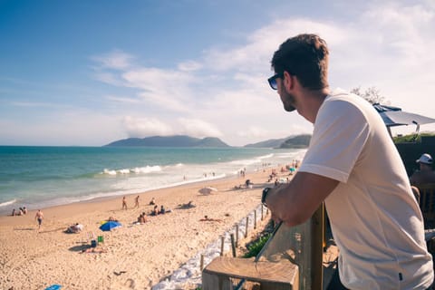 Nearby landmark, People, Natural landscape, Beach, group of guests