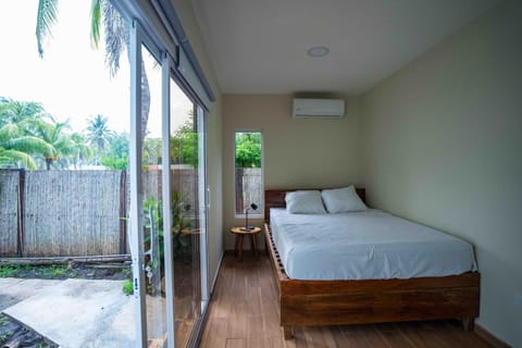 Patio, Bed, Day, Garden, Photo of the whole room, Bedroom, Garden view, air conditioner