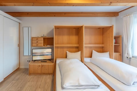 Direkt am Deich - Ferienwohnung Föhr im Gästehaus Am Badedeich Apartment in Dagebüll