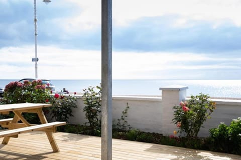 Absolute Beachfront with Decked Garden Oasis and Views Apartment in Bognor Regis