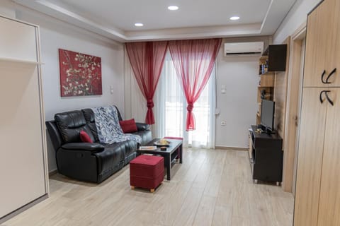 Communal lounge/ TV room, Living room, Seating area, wardrobe, air conditioner