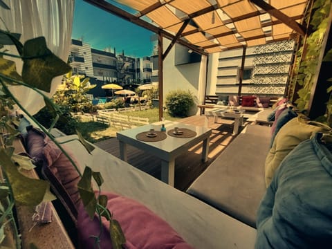 Patio, Day, View (from property/room), Balcony/Terrace, Living room, Seating area, Dining area