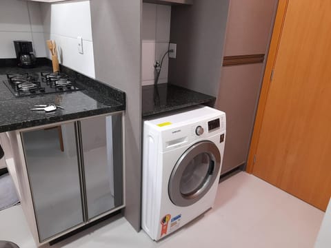 Kitchen or kitchenette, laundry, washing machine, dryer