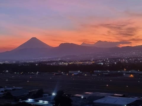 Amazing Volcano Views in front of airport Condo in Guatemala City