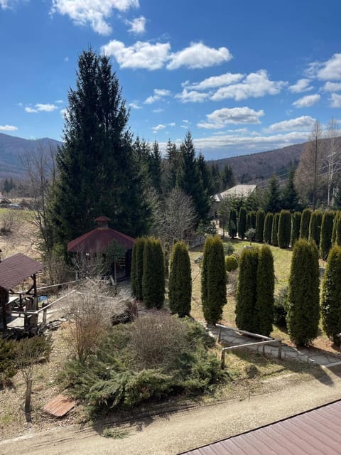 Property building, Spring, Day, Natural landscape, Garden, Garden view, Mountain view