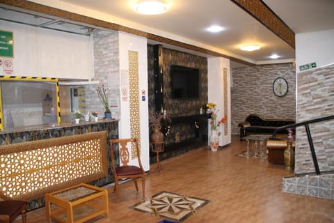 Staff, Communal lounge/ TV room, Living room, concierge, towels