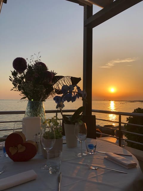 Restaurant/places to eat, Natural landscape, Sea view, Sunset