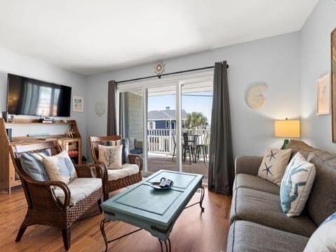 Laid Back By The Sea - Steps from the beach with amazing ocean views, Parking for 2 included, condo Condo in Carolina Beach