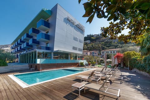 Property building, Facade/entrance, Day, Swimming pool